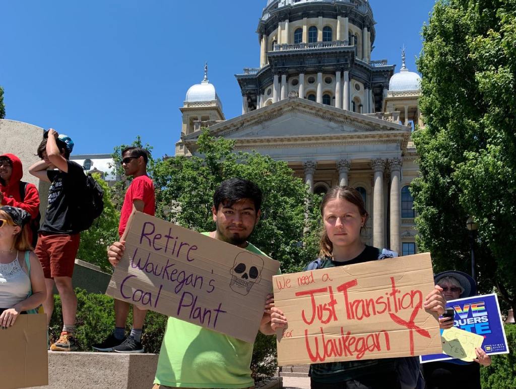 Youths with signs at Illinois statehouse